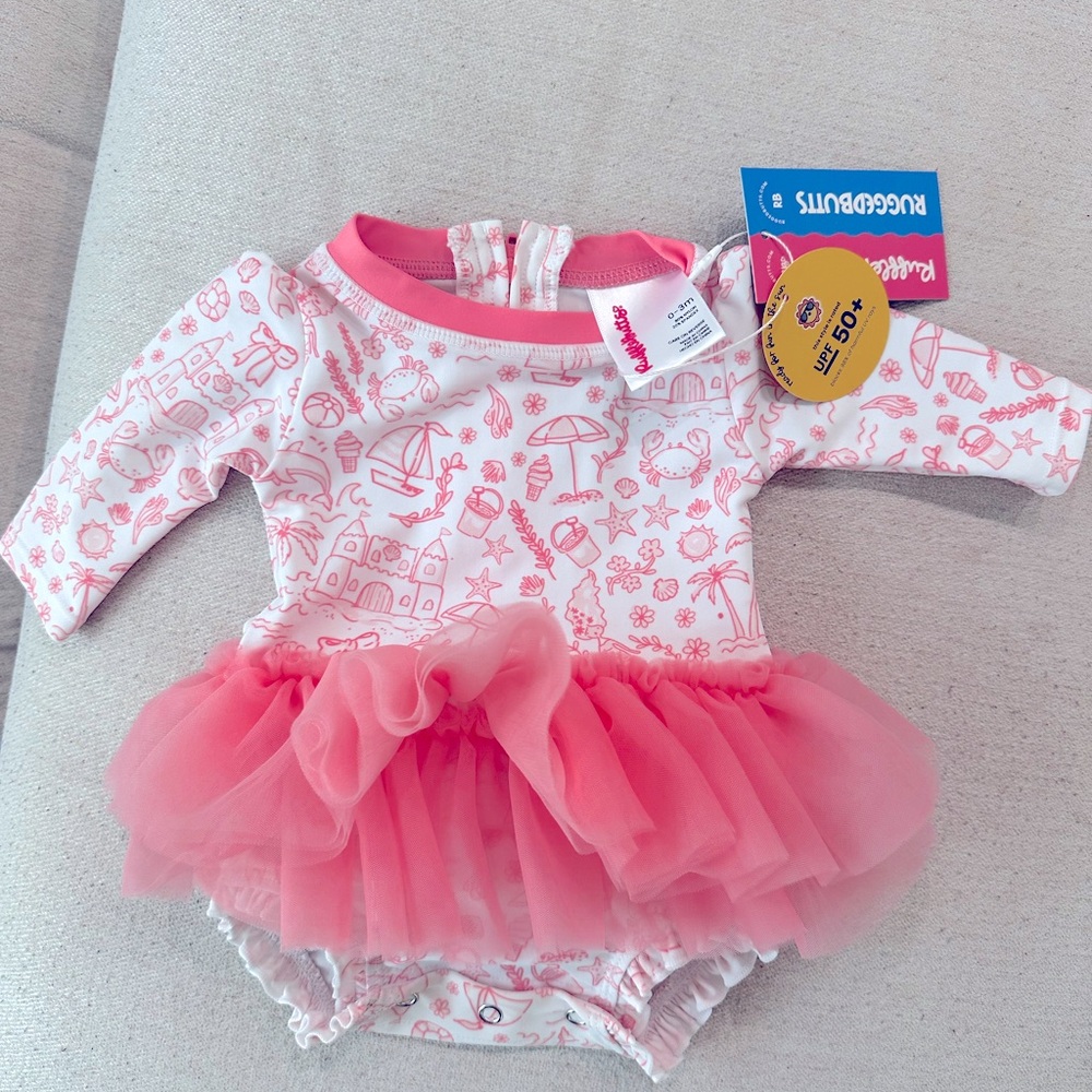 Ruffle Butts Pink and White Baby Onesie with Sea Print